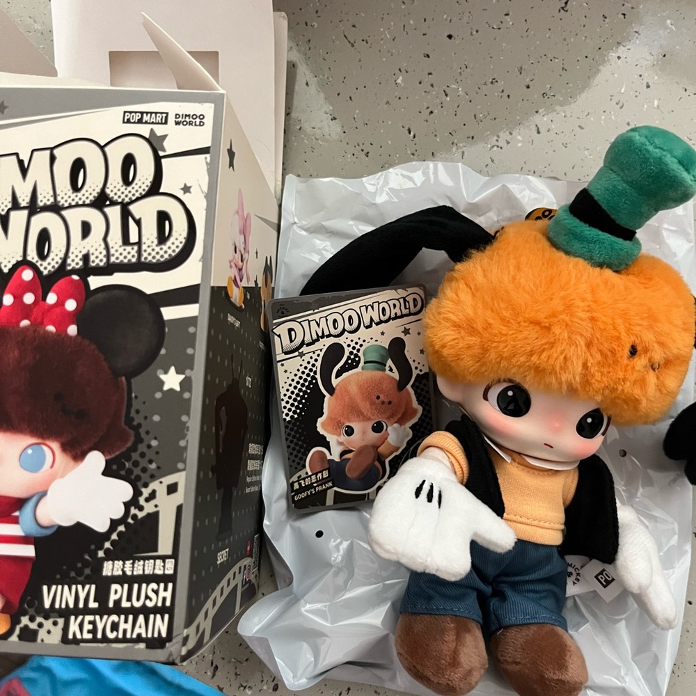 Pop Mart Dimoo World Vinyl Plush Keychain. Goofy